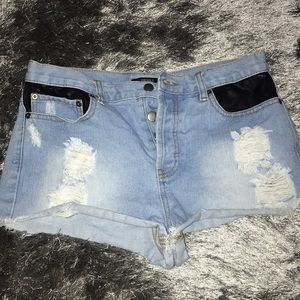 light washed, denim shorts, black leather detail